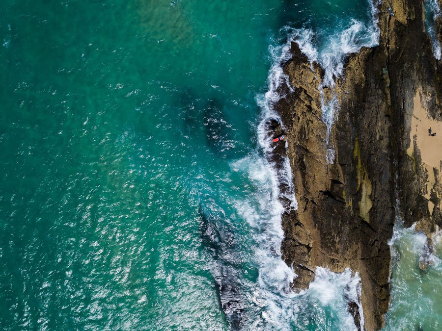 Drone flying over Queensland beach for fishing — CASA rules apply